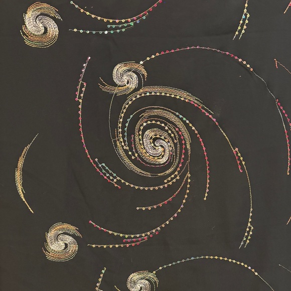Black sheer dress fabric with Colorful Swirl Patterns gold thread sequins. 600